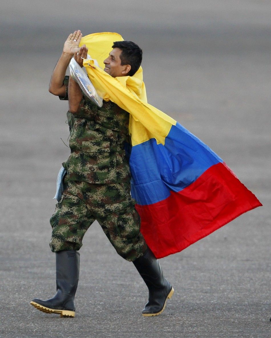 A soldier held hostage by FARC rebels celebrates as he arrives at Villavicencio039s airport after being freed