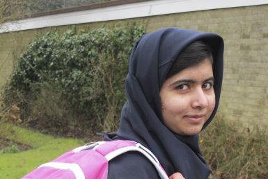 Malala Yousafzai smiles as she attends Edgbaston High School for girls in Edgbaston, central England in this handout photograph released March 19, 2013