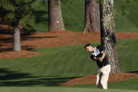 Martin Kaymer hits an approach shot at Augusta National in preparation for the Masters.
