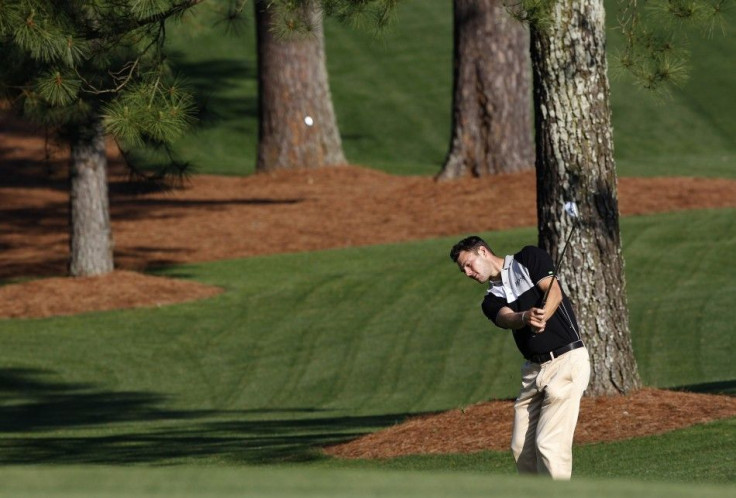 Martin Kaymer hits an approach shot at Augusta National in preparation for the Masters.