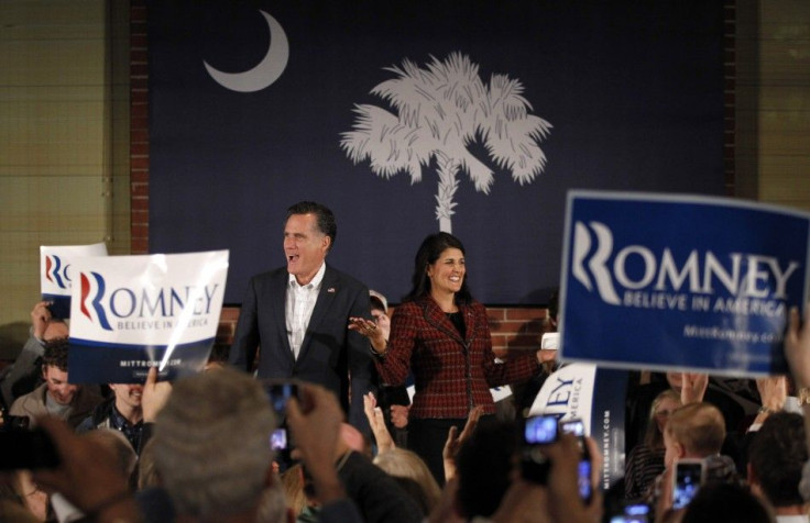 Republican presidential candidate Romney is introduced by South Carolina Governor Haley during a political rally at the Hall at Senate's End in Columbia