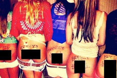 Chris Brown Tweets Photo Of Fans Writing “Breezy #1” On Their Butts