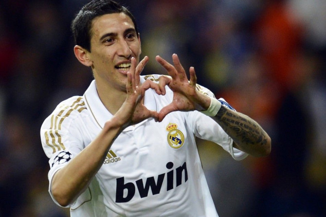 Real Madrid&#039;s Angel Di Maria celebrates after scoring a goal during their Champions League quarter-final second leg soccer match gainst APOEL at Santiago Bernabeu stadium in Madrid