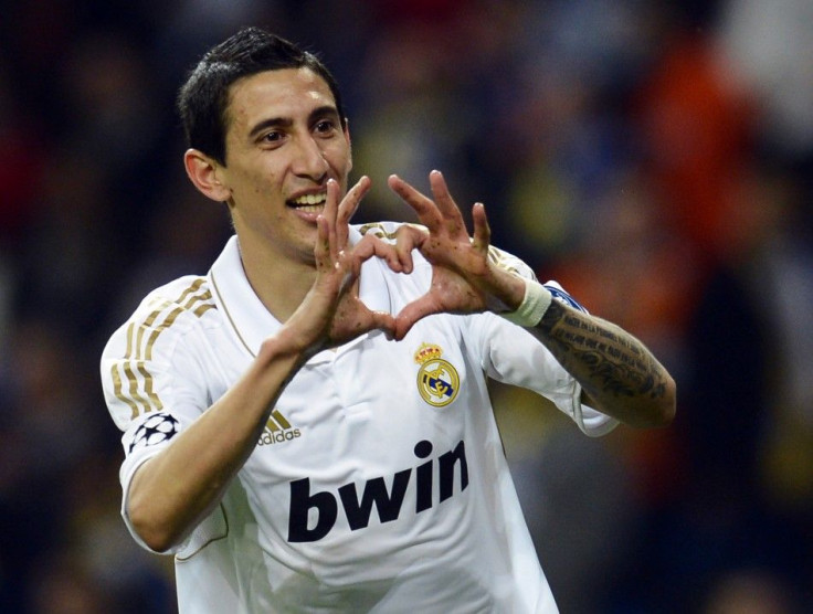 Real Madrid&#039;s Angel Di Maria celebrates after scoring a goal during their Champions League quarter-final second leg soccer match gainst APOEL at Santiago Bernabeu stadium in Madrid