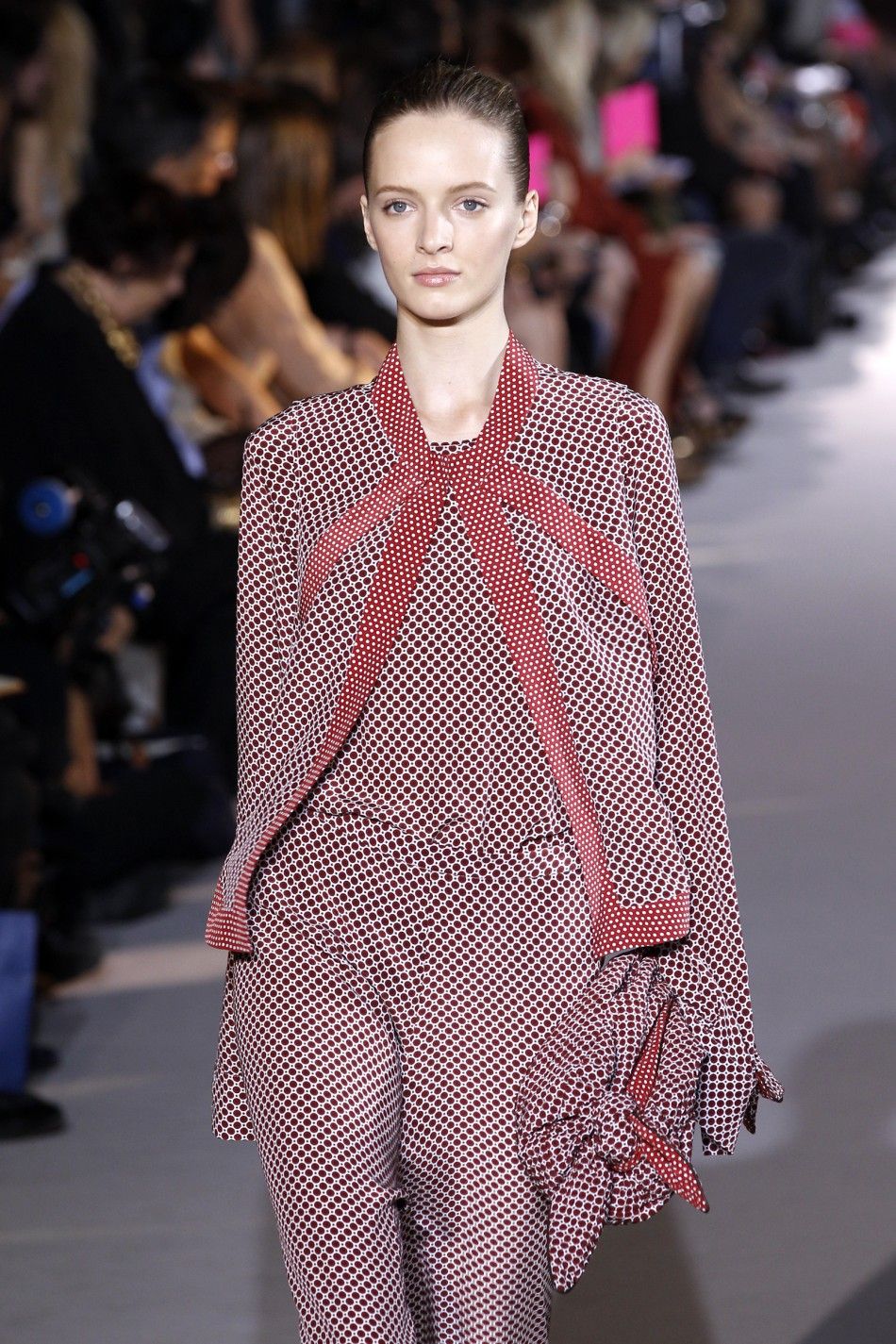 A model presents a creation by British designer Stella McCartney as part of her SpringSummer 2012 womens ready-to-wear fashion collection in Paris, October 3, 2011.
