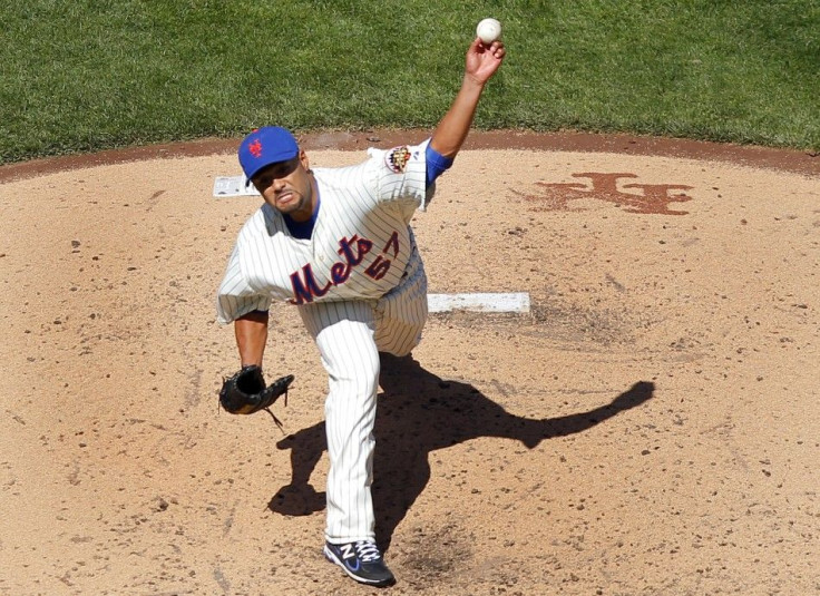 Johan Santana delivers a pitch against the Atlanta Braves on Opening Day.