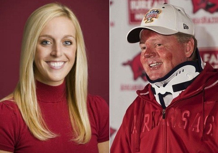 After his motorcycle crash on Sunday, University of Arkansas coach Bobby Petrino had his school and his family release reports that &quot;no other individuals were involved.&quot; But a police report released Thursday said Petrino did in fact have another