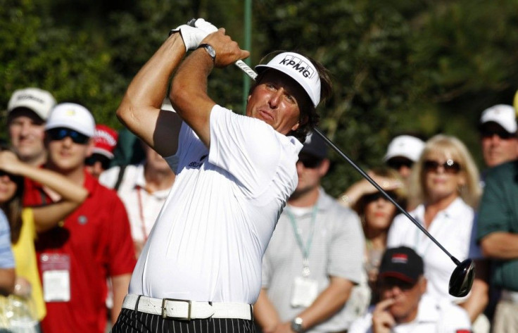 Phil Mickelson of the U.S. hits his tee shot on the 15th hole during third round play in the 2012 Masters Golf Tournament at the Augusta National Golf Club in Augusta, Georgia, April 7, 2012.