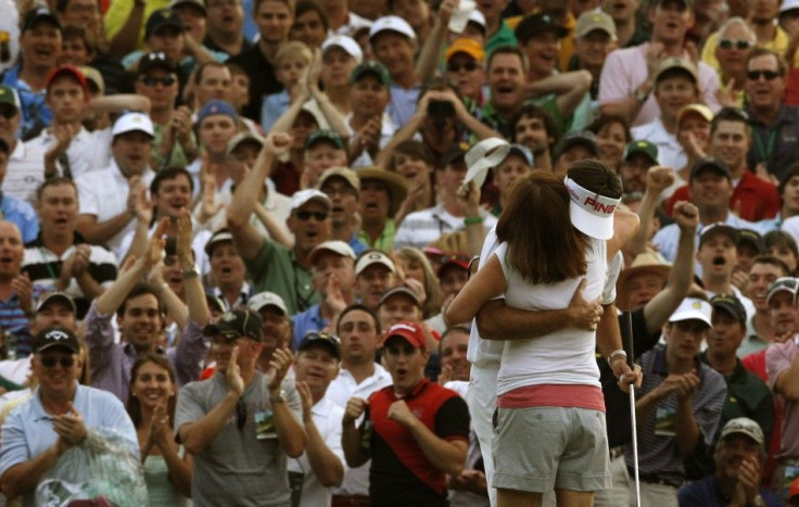 Bubba Watson hugs his mother Mollie after winning the 2012 Masters Golf Tournament at the Augusta National Golf Club in Augusta, Georgia, April 8, 2012.