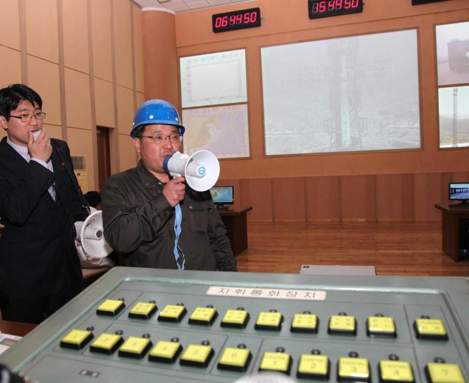 North Korean Representative Speaking with Interpreter