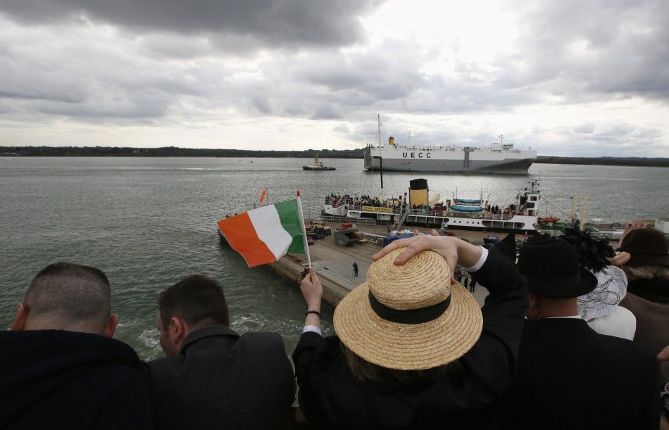 Sharon Sutton of Dublin waves as the Titanic Memorial Cruise leaves port in Southampton
