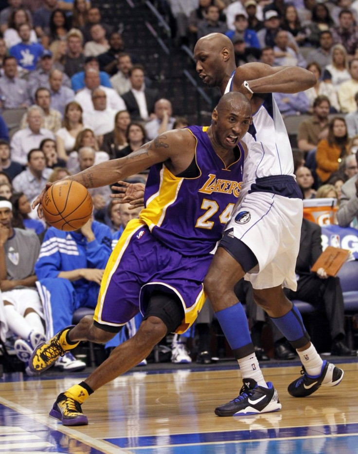 Lamar Odom guards Kobe Bryant during a game on Wednesday. Could the pair be reunited next season?