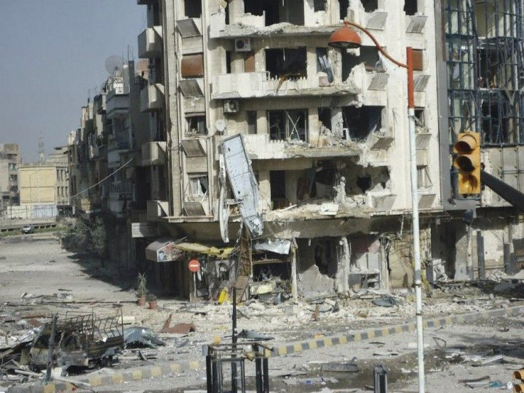 Buildings damaged in Homs from violence in Syria