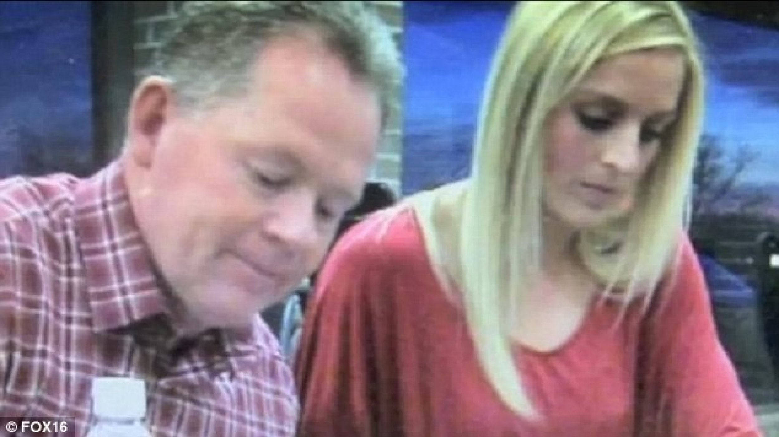 Jessica Dorrell next to Bobby Petrino at a signing event last week.