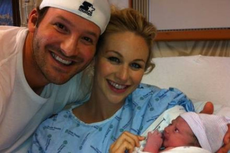 Candice, Tony and their new baby Hawkins Romo in their hospital room.