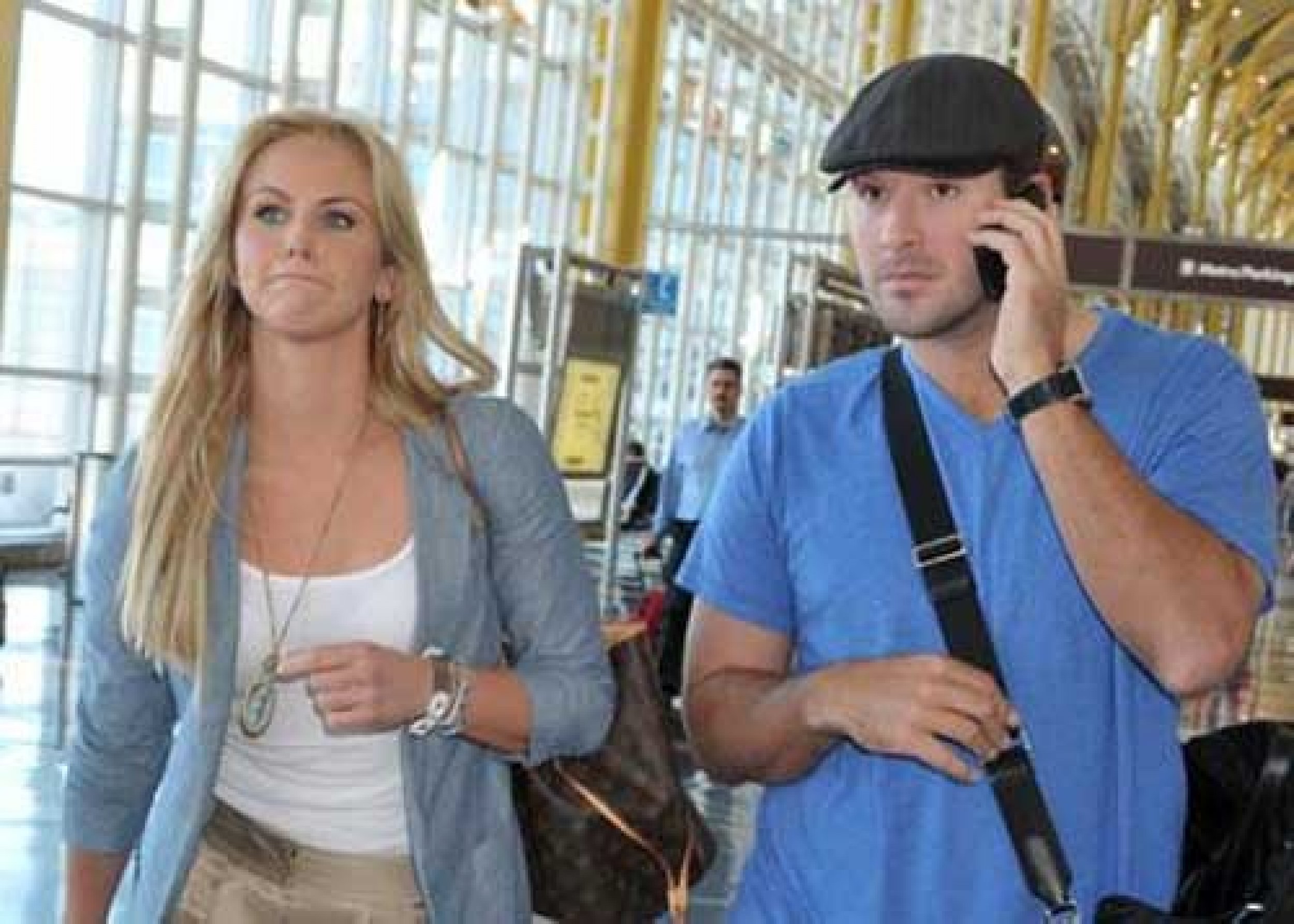 Crawford and Romo walk through an airport together.