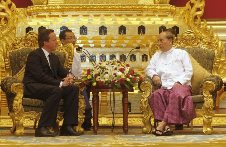 British Prime Minister David Cameron (L) listens to Myanmar&#039;s President Thein Sein during their meeting at the President&#039;s Office in Naypyitaw April 13, 2012.