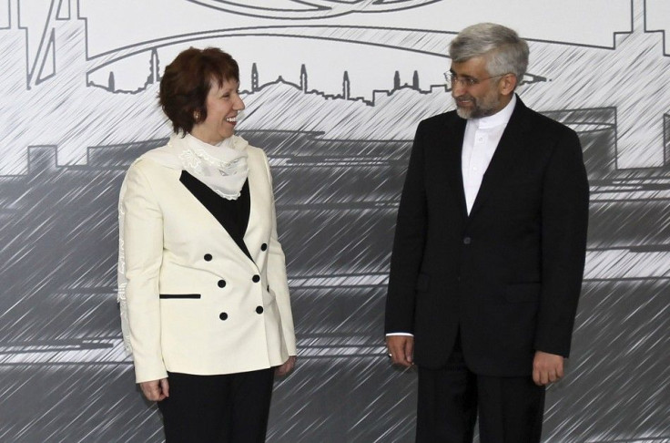 European Union foreign policy chief Catherine Ashton (L) and Iran's chief negotiator Saeed Jalili pose for media before their meeting in Istanbul April 14, 2012.