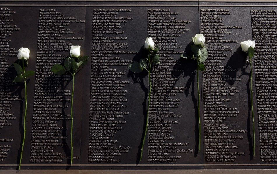 Roses rest on a plaque bearing the names of those who died when the Titanic sank, at the unveiling of the Titanic Memorial Garden in Belfast