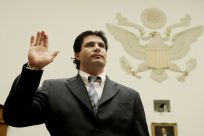 Former major league baseball player Jose Canseco is sworn in before House baseball steroids hearing.