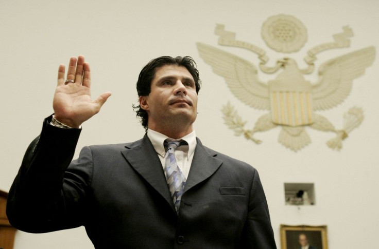Former major league baseball player Jose Canseco is sworn in before House baseball steroids hearing.