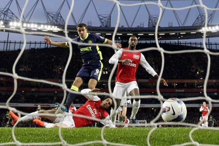 Watch highlights of Arsenal Vs. Wigan in the Premier League.