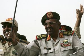 Sudanese President Omar al-Bashir and Defense Minister Muhammad Hussein during a Popular Defense Force rally in Khartoum in March