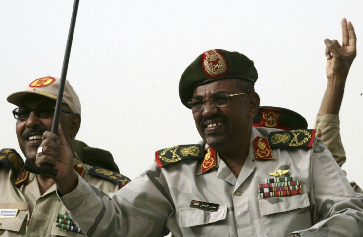 Sudanese President Omar al-Bashir and Defense Minister Muhammad Hussein during a Popular Defense Force rally in Khartoum in March