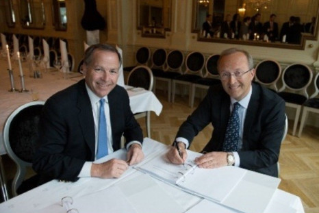 Cameron President and CEO, Jack B. Moore (left) and TTS Group President and CEO, Johannes D. Neteland