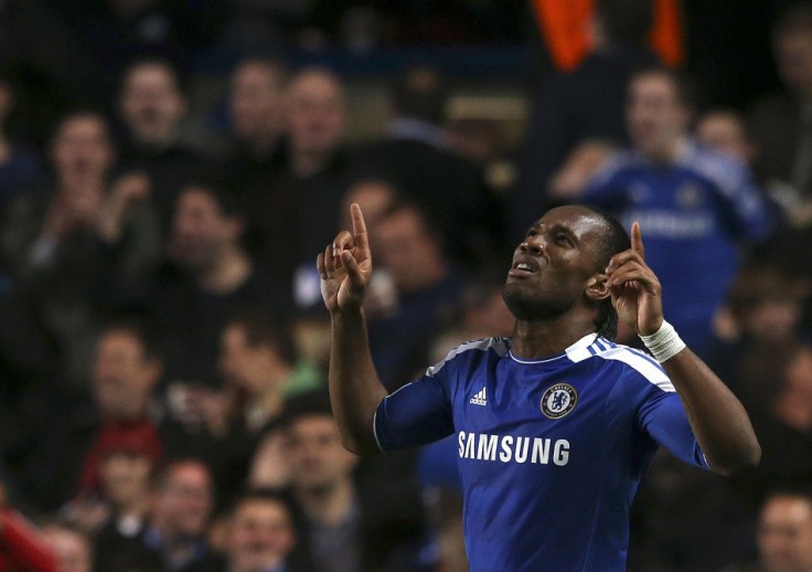 Didier Drogba celebrates after scoring the only goal of the game.