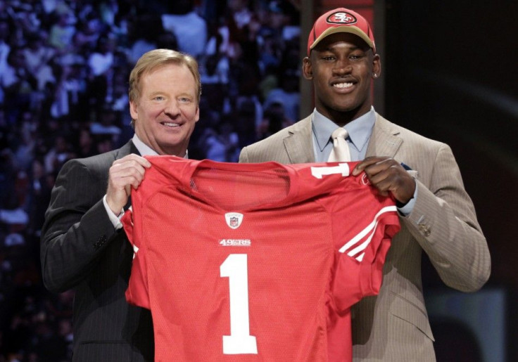 Defensive end Aldon Smith of University of Missouri with NFL Commissioner Goodell after being selected seventh overall pick by 49ers in 2011 NFL football Draft in New York