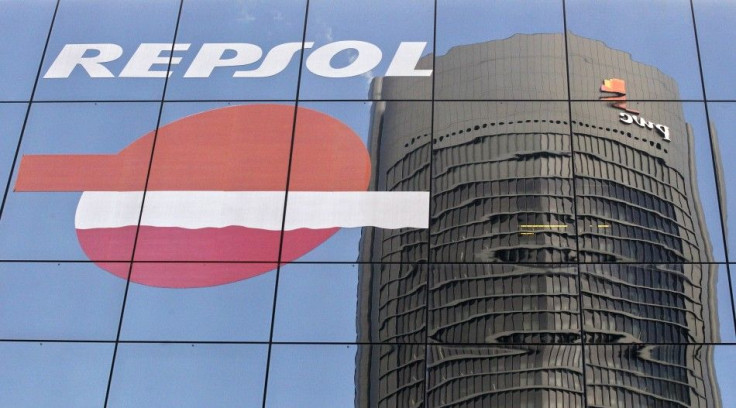 The Sacyr Vallehermoso Tower is reflected on the Repsol office building in Madrid