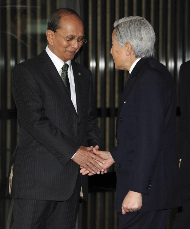 Japan&#039;s Emperor Akihito shakes hands with Myanmar&#039;s President Thein Sein after a tea party for leaders of the Mekong delta nations at the Imperial Palace in Tokyo.