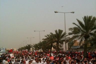 Protesters march towards the Formula One Grand Prix circuit in Bahrain 