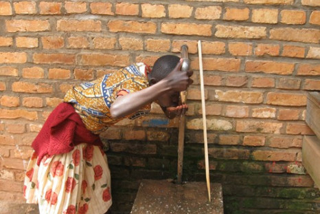 Girl Drinking Water in Rwanda.