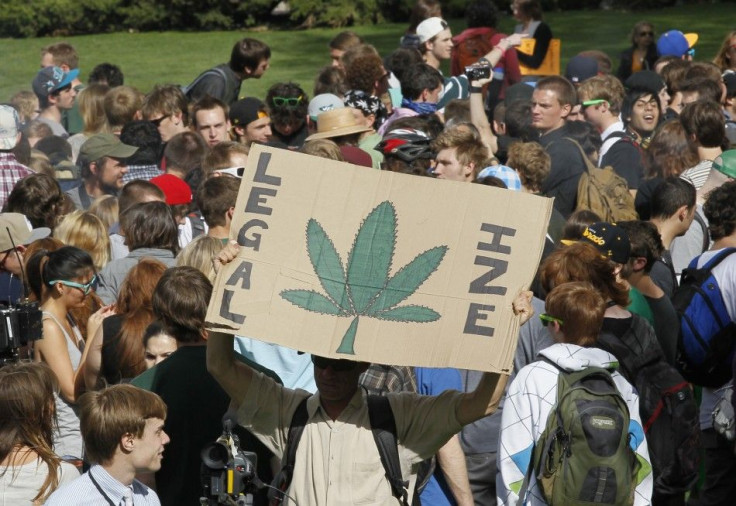 Students and others smoke marijuana at a pro-marijuana rally at the University of Colorado in Boulder