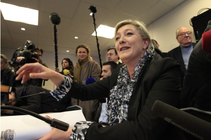 France&#039;s far right National Front party leader Marine Le Pen attends a meeting at the party&#039;s headquarters in Nanterre, near Paris