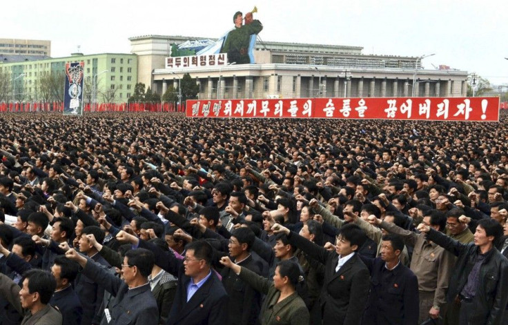 North Korean people and soldiers gather in Pyongyang to denounce South Korea&#039;s President Lee Myung-bak