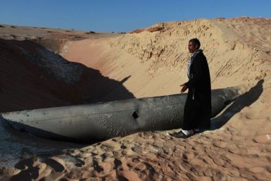 A Bedouin man looks at a gas pipeline in North Sinai