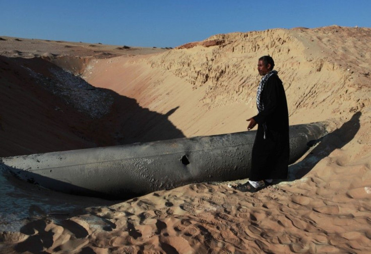 A Bedouin man looks at a gas pipeline in North Sinai