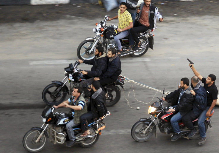 Hamas militants drag body through the streets of Gaza