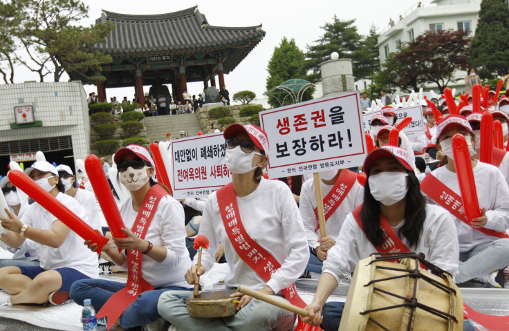 South Korean prostitutes protest police crackdown.