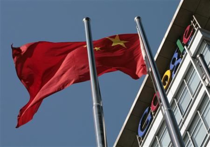 A Chinese national flag flies in front of Google China&#039;s headquarters in Beijing