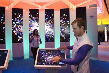 An intel demonstrator creates digital art at Intel's &quot;Visibly Smart Experience&quot; during the Consumer Electronics Show in Las Vegas