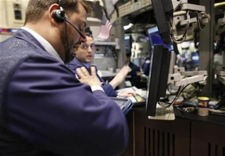 Traders work on the floor of the New York Stock Exchange