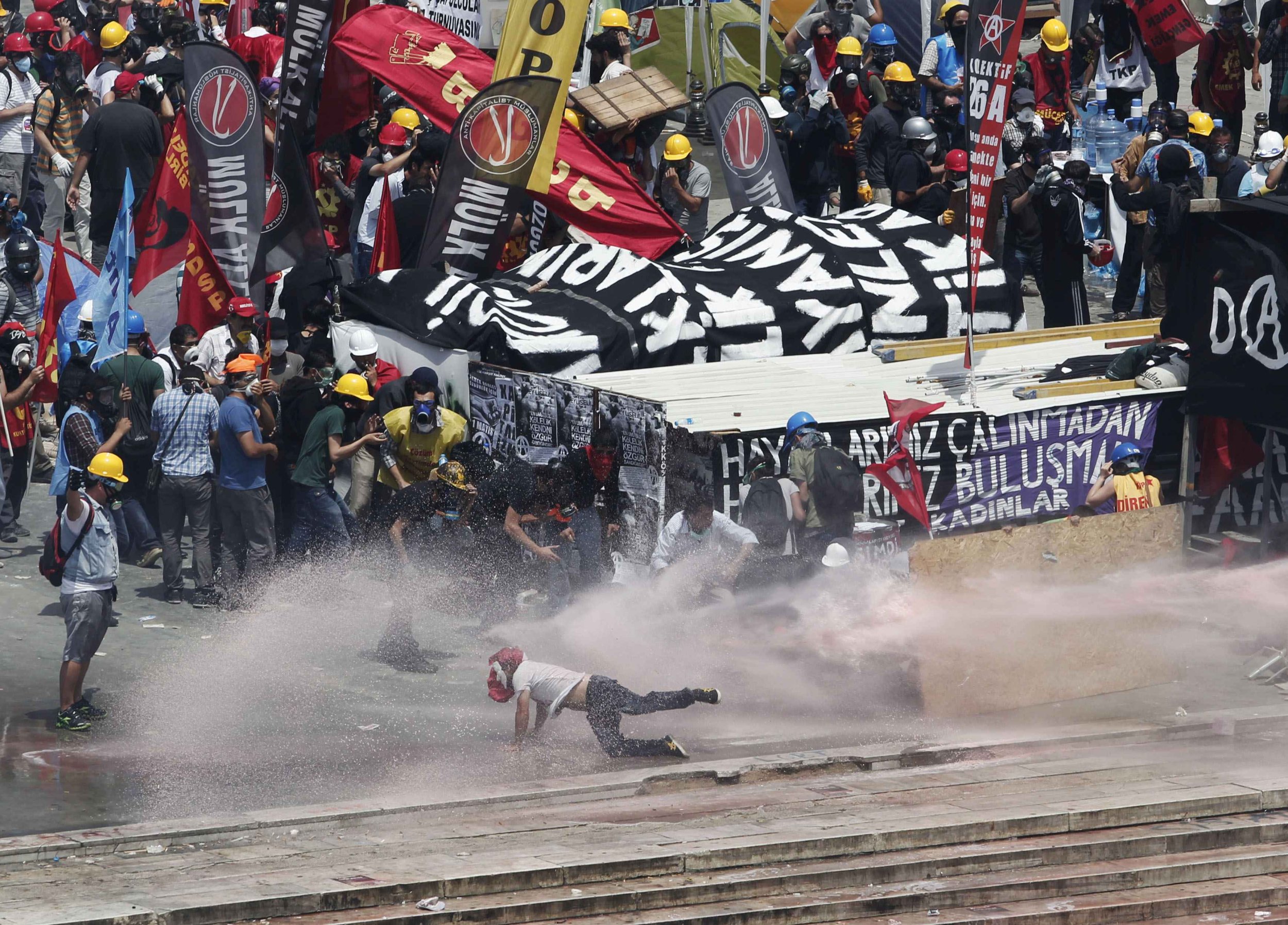 Protester Hit By Water Cannon
