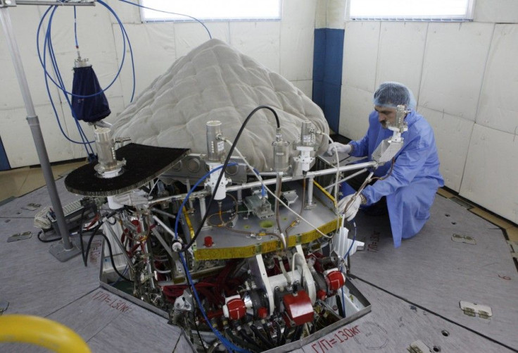 Engineer Vadim Rudnev works on the Geo-IK-2 space satellite, the one which was launched on February 1 and didn't establish contact with ground control center in due time, in the testing area of the open joint-stock company Reshetnev Information Satellite 