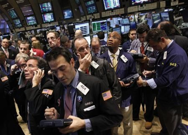 Traders work on the floor of the New York Stock Exchange