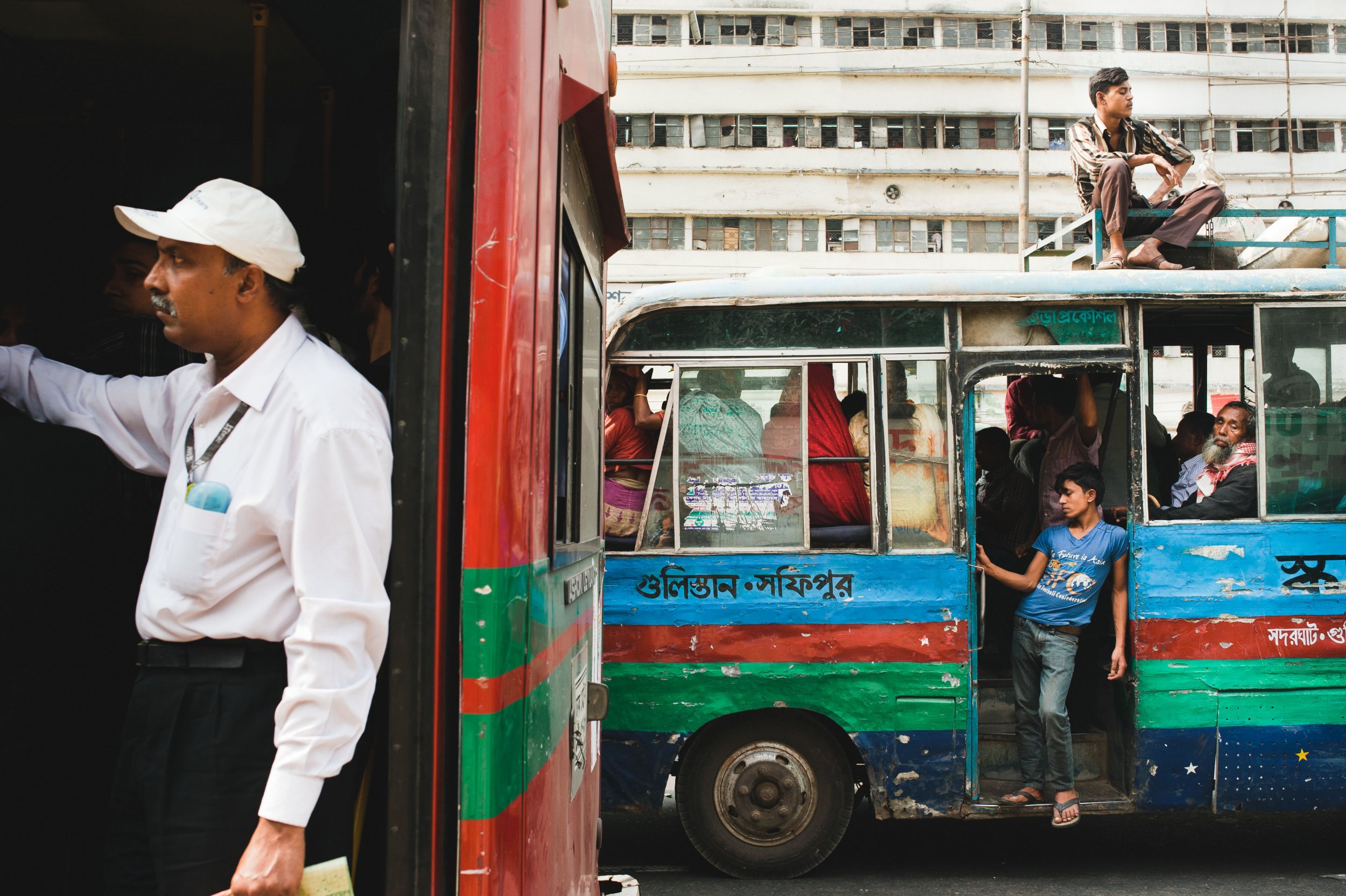Men on buses, Dhaka