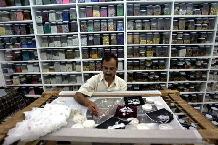 Indian embroiderer works at workshop of fashion designer Awatif Al-Hai in Kuwait City